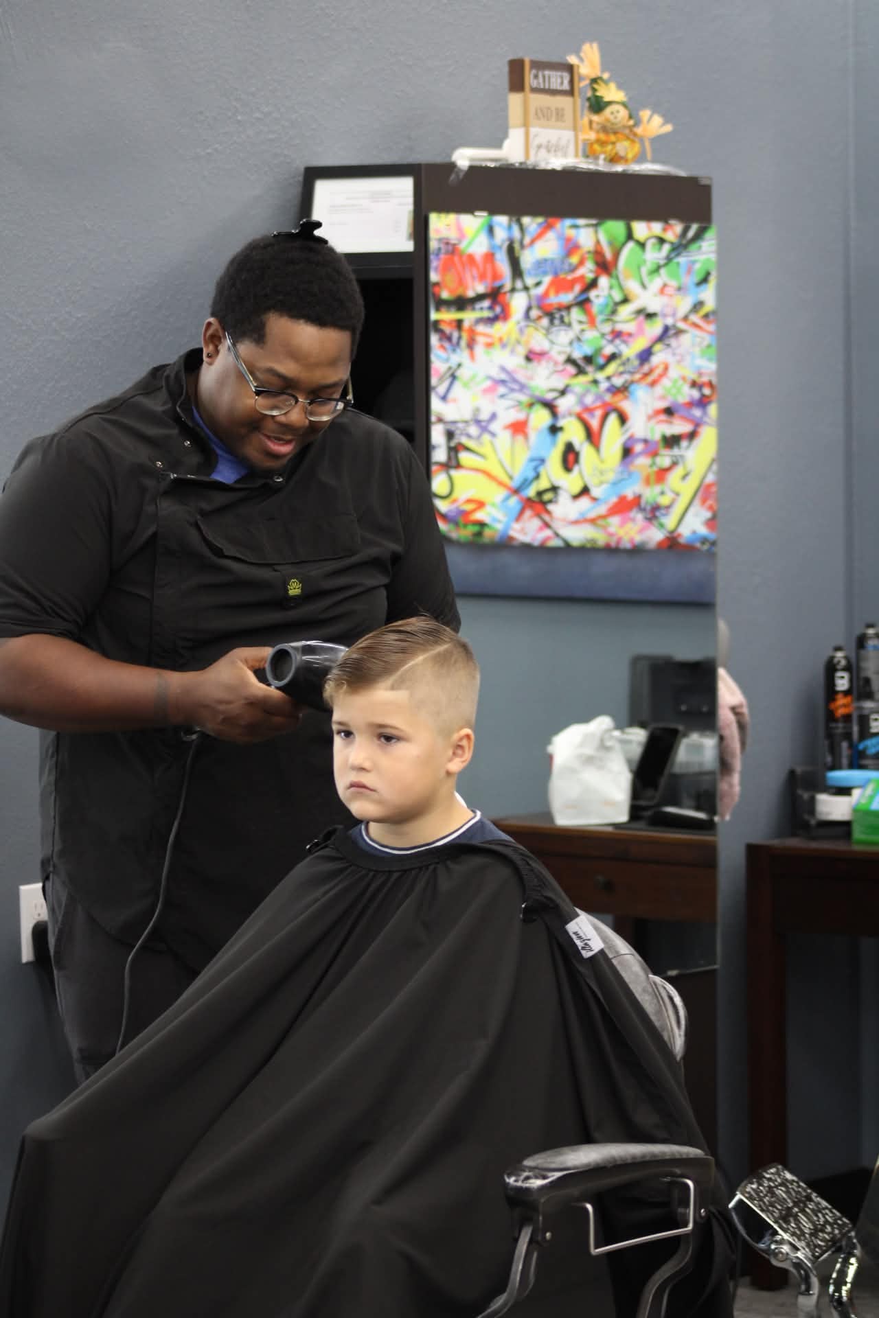 Kids haircut finished by Lenny in the barber studio